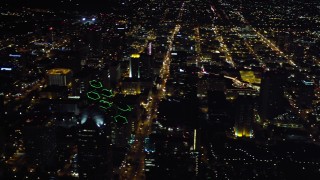 4K aerial stock footage pan across skyscrapers in Downtown San Diego, California, Night Aerial Stock Footage | DCA08_355