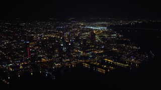 DCA08_374 - 4K aerial stock footage of city skyscrapers and piers in Downtown San Diego, California, Night