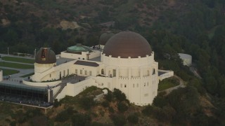 5K aerial stock footage orbit west side and front of the Griffith Observatory at sunset, California Aerial Stock Footage | DCLA_012