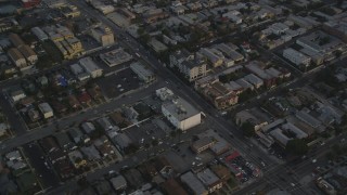 5K aerial stock footage tilt from Downtown Los Angeles skyline to Beverly Boulevard through Hollywood at sunset, California Aerial Stock Footage | DCLA_014