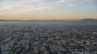 5K aerial stock footage approach Hollywood from Downtown Los Angeles, California at sunset Aerial Stock Footage | DCLA_022