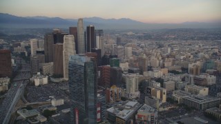 DCLA_039 - 5K aerial stock footage of Downtown Los Angeles Towers seen from The Ritz-Carlton at sunset, California