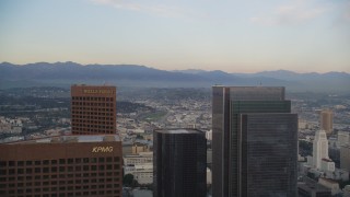 5K aerial stock footage fly between skyscrapers at sunset in Downtown Los Angeles, California Aerial Stock Footage | DCLA_044