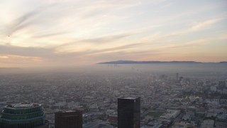 5K aerial stock footage of Century City seen from Downtown Los Angeles at sunset, California Aerial Stock Footage | DCLA_050