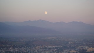 5K aerial stock footage tilt from full moon to reveal Downtown Los Angeles skyscrapers at twilight, California Aerial Stock Footage | DCLA_061