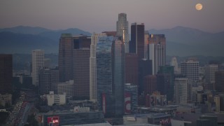 5K aerial stock footage flyby Downtown Los Angeles skyscrapers revealing full moon at twilight, California Aerial Stock Footage | DCLA_064