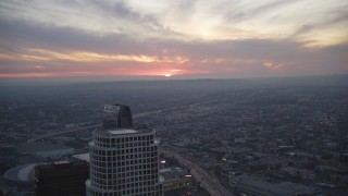 5K aerial stock footage fly over Downtown Los Angeles as sun sets on horizon, California Aerial Stock Footage | DCLA_078