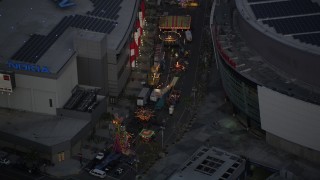 DCLA_081 - 5K aerial stock footage of a Christmas fair by the Nokia Theater in Downtown Los Angeles at twilight, California