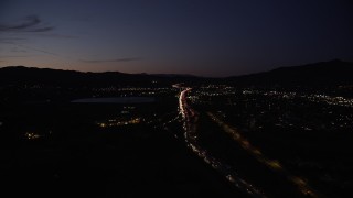 5K aerial stock footage approach interchange with the 5 and 405 freeways in Sylmar at night, California Aerial Stock Footage | DCLA_089