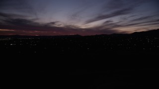 5K aerial stock footage tilt and fly low over a reservoir in Sylmar at night, California Aerial Stock Footage | DCLA_091