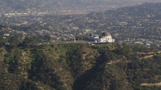 5K aerial stock footage of Griffith Observatory overlooking Los Angeles Basin in California Aerial Stock Footage | DCLA_108