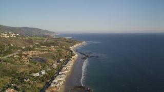 5K aerial stock footage fly over Highway 1 and homes on the beach in Malibu, California Aerial Stock Footage | DCLA_167