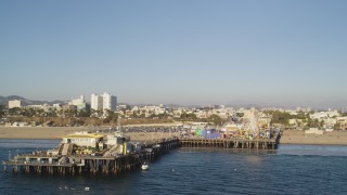 5K aerial stock footage fly near the end of Santa Monica Pier with rides in California Aerial Stock Footage | DCLA_181