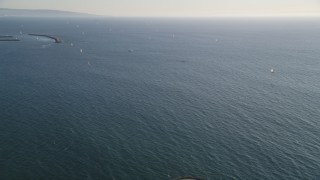 5K aerial stock footage of sailboats seen from Venice Fishing Pier in California Aerial Stock Footage | DCLA_185