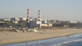 DCLA_190 - 5K aerial stock footage of beachside oil refinery with smoke stacks in El Segundo, California