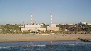 DCLA_191 - 5K aerial stock footage of beachfront oil refinery and smoke stacks in El Segundo, California