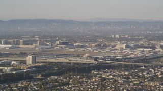 DCLA_202 - 5K aerial stock footage of Interstate 405/105 freeway interchange by LAX Airport, California