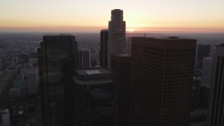 5K aerial stock footage tilt from streets to reveal and approach skyscrapers at twilight in Downtown Los Angeles, California Aerial Stock Footage | DCLA_251