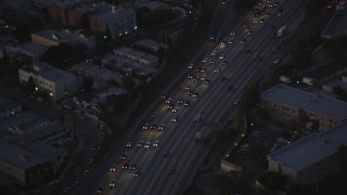 5K aerial stock footage bird's eye of heavy traffic on Highway 101 at twilight in Hollywood, California Aerial Stock Footage | DCLA_272