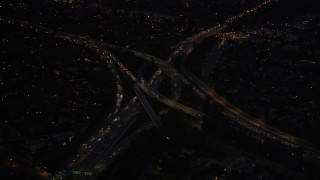 DCLA_288 - 5K aerial stock footage approach Hollywood Split freeway interchange at night in North Hollywood, California