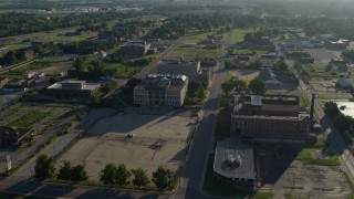 DX0001_000558 - 5.7K aerial stock footage of hospital and government buildings at sunrise, East St Louis, Illinois