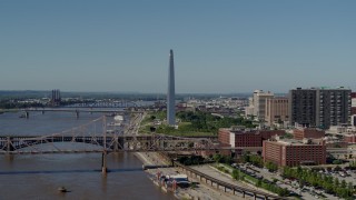 5.7K aerial stock footage of the Gateway Arch beside the river in Downtown St. Louis, Missouri Aerial Stock Footage | DX0001_000594