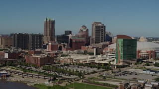 5.7K aerial stock footage approach Lumière Place/Four Seasons Hotel and skyscrapers in Downtown St. Louis, Missouri Aerial Stock Footage | DX0001_000599