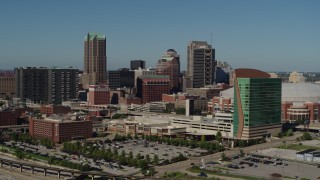 DX0001_000600 - 5.7K aerial stock footage of a reverse view of Lumière Place/Four Seasons Hotel in Downtown St. Louis, Missouri