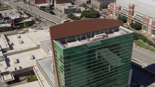 5.7K aerial stock footage orbit the Four Seasons Hotel, tilt to reveal Gateway Arch, Downtown St. Louis, Missouri Aerial Stock Footage | DX0001_000637