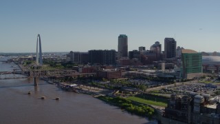 5.7K aerial stock footage of a reverse view of the Arch and downtown buildings from the river, Downtown St. Louis, Missouri Aerial Stock Footage | DX0001_000645