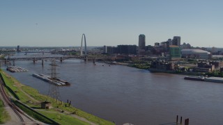 5.7K aerial stock footage approach the river and bridge near Gateway Arch, Downtown St. Louis, Missouri Aerial Stock Footage | DX0001_000649