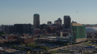 5.7K aerial stock footage of flying away from the Four Seasons and Lumière Place hotels in Downtown St. Louis, Missouri Aerial Stock Footage | DX0001_000658