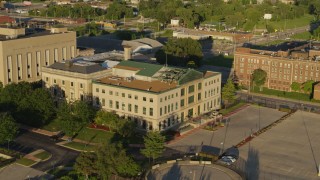 5.7K aerial stock footage of approaching a federal courthouse at sunset in East St. Louis, Illinois Aerial Stock Footage | DX0001_000685