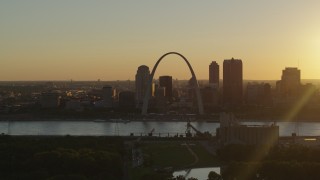 5.7K aerial stock footage of a view of the Gateway Arch and Downtown St. Louis, Missouri skyline at sunset Aerial Stock Footage | DX0001_000707