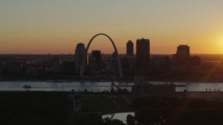 5.7K aerial stock footage of Downtown St. Louis, Missouri and the Gateway Arch across the river at sunset Aerial Stock Footage | DX0001_000717