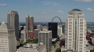 DX0001_000778 - 5.7K aerial stock footage of a view across the city to the museum by the Gateway Arch in Downtown St. Louis, Missouri