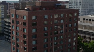 5.7K aerial stock footage orbit and reverse view of a brick office building in Downtown St. Louis, Missouri Aerial Stock Footage | DX0001_000800