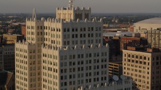 5.7K aerial stock footage of flying away from an apartment building at sunset, Downtown St. Louis, Missouri Aerial Stock Footage | DX0001_000841