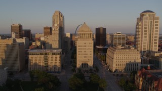 5.7K aerial stock footage of courthouses seen while descending at sunset, Downtown St. Louis, Missouri Aerial Stock Footage | DX0001_000846