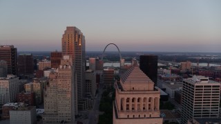 5.7K aerial stock footage approach downtown courthouse and reveal the Arch at sunset, Downtown St. Louis, Missouri Aerial Stock Footage | DX0001_000873