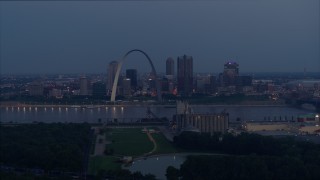 5.7K aerial stock footage of the Gateway Arch at twilight across the Mississippi River, Downtown St. Louis, Missouri Aerial Stock Footage | DX0001_000898