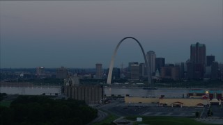 5.7K aerial stock footage of passing the Gateway Arch and the skyline of Downtown St. Louis, Missouri, at twilight Aerial Stock Footage | DX0001_000915