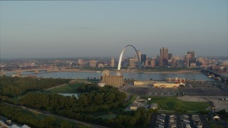 5.7K aerial stock footage flyby grain elevator with view of the Gateway Arch in the morning, and descend, Downtown St. Louis, Missouri Aerial Stock Footage | DX0001_000963