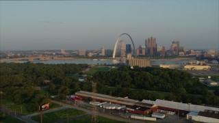 DX0001_000964 - 5.7K aerial stock footage flyby park with view of the Gateway Arch in the morning, Downtown St. Louis, Missouri