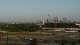 5.7K aerial stock footage ascend for a view of the Gateway Arch from East St. Louis in the morning, Downtown St. Louis, Missouri Aerial Stock Footage | DX0001_000966