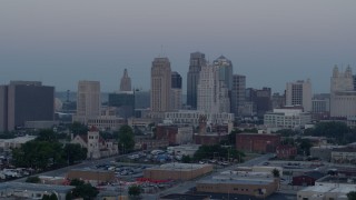 5.7K aerial stock footage flyby the city's tall skyscrapers at twilight in Downtown Kansas City, Missouri Aerial Stock Footage | DX0001_000985