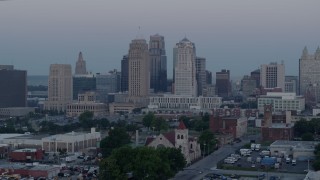 5.7K aerial stock footage of approaching the city's tall skyscrapers at twilight in Downtown Kansas City, Missouri Aerial Stock Footage | DX0001_000988