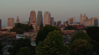 5.7K aerial stock footage of the city skyline while descending at sunrise, Downtown Kansas City, Missouri Aerial Stock Footage | DX0001_001000