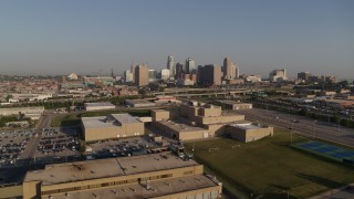 5.7K aerial stock footage of approaching tech school and the city skyline of Downtown Kansas City, Missouri Aerial Stock Footage | DX0001_001034