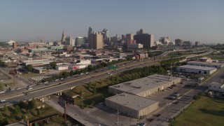 5.7K aerial stock footage flyby a freeway east of city office buildings in Downtown Kansas City, Missouri Aerial Stock Footage | DX0001_001038